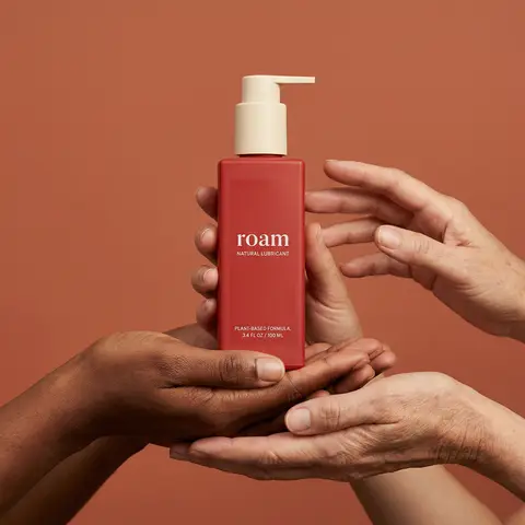 Roam Skincare Pump Bottle Diverse Hands Terracotta Studio Shot