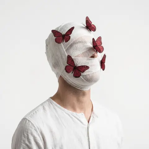 Bandaged Face Red Butterflies White Studio Portrait Conceptual Art